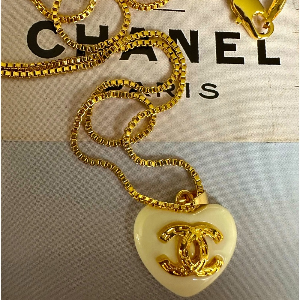 Chanel Gold Tone Acrylic Zipper Pull Button Charm Necklace